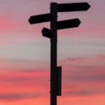 directions_against_sunset